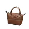 Bolso de Mano de Piel de Vaca Texturizada de Primera Capa Más Vendido Transfronterizo, Bolso Tipo Empanada de Diseño Nicho Estilo Coreano, Bolso Cruzado de Moda para Mujer