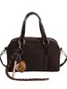 Bolso pequeño cuadrado de alta gama estilo coreano para mujer, nuevo bolso Boston tipo almohada vintage otoño 2026, bolso de hombro y bandolera