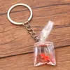 28 Estilos 28X90Mm DIY Resina Transparente Imitação Peixe Dourado Peixe Palhaço Pingente de Bolso Joia Acessório de Chaveiro