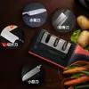 Afia Faca Multifuncional Rápido Doméstico Portátil Pedra de Afiar de Três Estágios Gadget de Cozinha Ferramenta de Afiar Facas Venda por Atacado de Fábrica