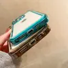 Adecuado para iPhone 16 Pro Max Dos en Uno Acrílico Espacial Transparente 17P Botón Electrochapado Ranura para Pegamento Carcasa