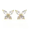 Exquisitos aretes de mariposa estilo coreano, aretes de circón versátiles de alta gama de nicho, elegantes aretes para el día a día para mujer, venta al por mayor de fábrica