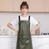 Delantal moderno impermeable y a prueba de aceite de PU lavable para cocina casera, delantal de cocina modelo nuevo, ropa de trabajo especializada para catering con texto impreso