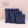 Bolsa de almacenamiento para metralla bolsa de almacenamiento para cosméticos cable de datos cable para teléfono móvil auriculares tapones para los oídos apriete automático bolsa para lápiz labial