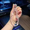 Llavero de coche único con diseño de estrella de doble capa con cuentas, cadena para teléfono moderna y elegante, colgante de pentagrama para bolso