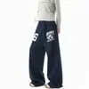 Pantalones deportivos azules con estampado de letras, estilo hombre, pantalones de pierna recta para hip-hop callejero americano, con un diseño de pierna ancha, fluido y curvo