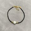 Collar de Perlas con Cuentas de Arroz Negro de Diseño Nicho Europeo y Americano para Mujer, Estilo Frío de Alto Nivel con Superposición, Cadena para Clavícula