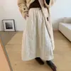 Falda acolchada gruesa de color liso retro japonesa casual coreana para mujer, nueva, versátil, ajustada, de vuelo, para otoño e invierno