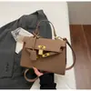 Bolsa de Ombro Transversal Versátil Estilo Coreano Simples Casual Nicho Nova Moda Bolsa de Mão Feminina Bolsa Kelly Casual