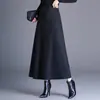 Falda de lana de corte A con estampado de leopardo de moda para mujer, nuevo estilo otoño e invierno 2026, de cintura alta, que cubre la cadera, con dobladillo amplio, moderna y rejuvenecedora