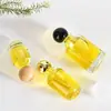 Suministro directo al por mayor botella de perfume 30ml50ml100ml botella de vidrio para perfume botella secundaria botella con atomizador botella de perfume cilíndrica