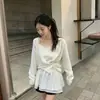Enviado. Blusa de tricô com mangas compridas e botões diagonais, design único chique coreano, blusa casual solta 18293