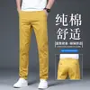 Pantalones Casuales de Gama Alta Color Blanco Crudo para Hombre 2026 Nuevo Estilo Otoño Ajustados Rectos Elásticos para Hombre Pantalones de Vestir