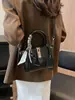 Bolsa de Mão Casual para Mulheres 2026 Novo Estilo Elegante Versátil Bolsa de Ombro Transversal Design Coreano Bolsa Saco