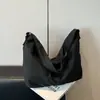 Bolso tote de gran capacidad modelo nuevo 2026 transfronterizo, bolso de hombro versátil de color sólido, adecuado para el uso diario, bolso de axila, bolso cruzado
