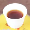 Bolo de ouro de corte no atacado (cozinhado) Chá Pu'er redondo de árvore Menghai, Yunnan, primavera inicial, bolo de chá da corte 200g