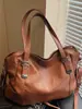 Bolso de Mujer 2026 Primavera Nuevo Estilo Bolso Tote para el Trabajo Retro Europeo y Americano Bolso de Hombro Cruzado de un Solo Hombro Gran Capacidad Bolso Sencillo para el Brazo