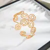 Colección de Pulseras de Brazo, Pulseras Abiertas Metálicas con Flor y Borla Transfronterizas Europeas y Americanas para Mujer, Moda Personalizada, Accesorios de Estilo Marino Sencillo