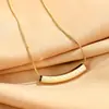 O mesmo design de nicho clássico trevo de quatro folhas padrão sorriso forma não desbota acessórios colar de aço titânio clavícula cadeia