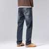 Moda popular para hombre / Nueva colección Primavera/Otoño 2026: pantalones de mezclilla elásticos para hombre, tiro medio a alto, ligeros, estilo casual de negocios, corte ajustado, versátiles