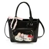 Bolso de mano estilo coreano transfronterizo, nuevo modelo 2026 para niñas, bolso tipo cubo simple, alto valor estético, bolso cruzado versátil