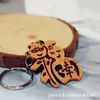 Venta caliente llavero imitación madera pequeño colgante de regalo creativo imitación madera ábaco bicicleta llavero práctico regalo