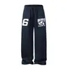 Pantalones de chándal de moda estilo americano hip-hop para hombres y mujeres, pantalones casuales estampados de alta calle para primavera, pantalones de pierna ancha deportivos para danza jazz