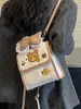 Linda mochila de oso de dibujos animados para mujer, nuevo estilo 2026, diseño simple, adecuada para estudiantes y personas que van al trabajo, mini mochila con un lazo