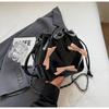 Bolso pequeño de estilo occidental de alta gama para mujer, nuevo bolso cruzado con cadena a juego, bolso tipo cubo con lazo de nicho súper popular, 2024
