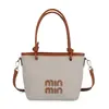 Bolso de Cubo de Mano de Estilo de Gama Alta para Mujer 2026 Nueva Moda Tendencia Tela Bloqueo de Color Bolso Cruzado Pequeño