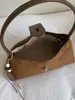 Bolso pequeño cuadrado de color sólido retro de alto valor para mujer, nuevo estilo de otoño 2026, bolso de mano de hombro moderno y elegante