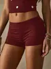 Bestseller transfronterizo europeo y americano Y2K shorts elásticos para mujer, tiro bajo, corte ajustado, color liso, hot pants básicos ajustados