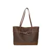Bolso bandolera de alta gama de gran capacidad para el hombro para commuting de mujer 2026 nuevo bolso tote de color liso en bloque bolso de hombro único retro