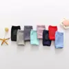 Rodilleras de poliéster-algodón para niños, coderas, calcetines de rizo para bebé, calcetines antideslizantes para gatear de primavera/verano para recién nacidos con puntos de agarre, venta al por mayor para bebés