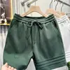 Pantalones cortos deportivos casuales de alta gama para hombre, diseño clásico americano de tres rayas, de peso pesado, para verano, corte holgado, hasta la rodilla