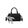 Bolso de mano de alta gama de nicho tipo bolsa de almohada para mujer, nueva tendencia de moda 2026, versátil para ir al trabajo, bolso de hombro y bolso cruzado