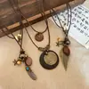 Collar de Pluma de Bronce para Mujer, Estilo Étnico Bohemio, Diseño Largo de Doble Capa, Accesorio de Alta Gama con un Toque de Nicho y Sofisticado