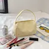Bolsa de mano de gran capacidad de color sólido de alta gama, bolsa de maquillaje de viaje portátil, bolsa de almacenamiento, Novedad Verano 2026 Transfronterizo