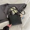 Bolso de axila para mujer para ir al trabajo, Moda vintage de nicho para la primavera de 2026, Bolso tipo cubo, Bolso de axila moderno estilo coreano