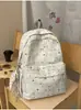 Mochila macia com gradiente estrelado amarelo limão, tema floresta, para meninas e estudantes, com sensação leve e arejada, doce e delicada, perfeita para viagens