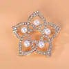 Broche de aleación de moda coreana al por mayor sentido de alta gama nicho accesorios de corsage de perlas hebilla de pin para cuello de mujer que combina con todo