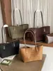 Bolso de mano retro de moda transfronterizo, bolso de hombro grande de moda, nuevo bolso casual con textura para mujer 2026