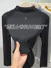 Top base de canalé de cuello alto medio para mujer, nuevo otoño/invierno 2026, corte ajustado, adelgazante, se puede usar como capa interior o exterior, top negro de manga larga