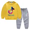 Conjunto de Ropa Infantil Transfronterizo Nuevo Primavera y Otoño 2026: Conjunto de Dos Piezas para Niños: Sudadera y Pantalón Largo, Atuendo de Algodón de Manga Larga de Color Sólido para Bebés