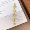 Colgante Chapado en Cobre Oro Real Borla Diseño Sencillo Circonita Micro-pavimentada Accesorios de Joyería Luna Estrellas Accesorios que no se decoloran