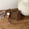 Bolsa de Axila Transfronteiriça para Mulheres 2025 Nova Tendência Moda de Nicho Bolinhas Laço Bolsa de Ombro Bolsa de Lancheira para o Trabalho