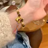 Nuevo Pulsera Trenzada de Moneda de Caballo con Piedra Ojo de Tigre Estilo Chino para Mujer, Pulsera de Lujo Ligero y Gama Alta, Pulsera de Diseño de Nicho