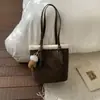 Bolsa Retro Fosca de Nicho com Pelo de Cordeiro para Mulheres 2025 Nova Versátil para o Dia a Dia Bolsa de Ombro Axila Bolsinha Bolsa Saco