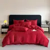 Juego de cuatro piezas de algodón cepillado ultrasuave y amigable con la piel, estilo de lujo ligero de alta gama, funda nórdica suave y simple de jacquard de algodón lavado, funda de almohada