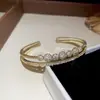 Pulsera de Oro Real de 14K Electrochapado con Cierre Redondo de Circonita Moda Casual Versátil Joyería de Lujo Ligero de Alta Gama para Mujeres